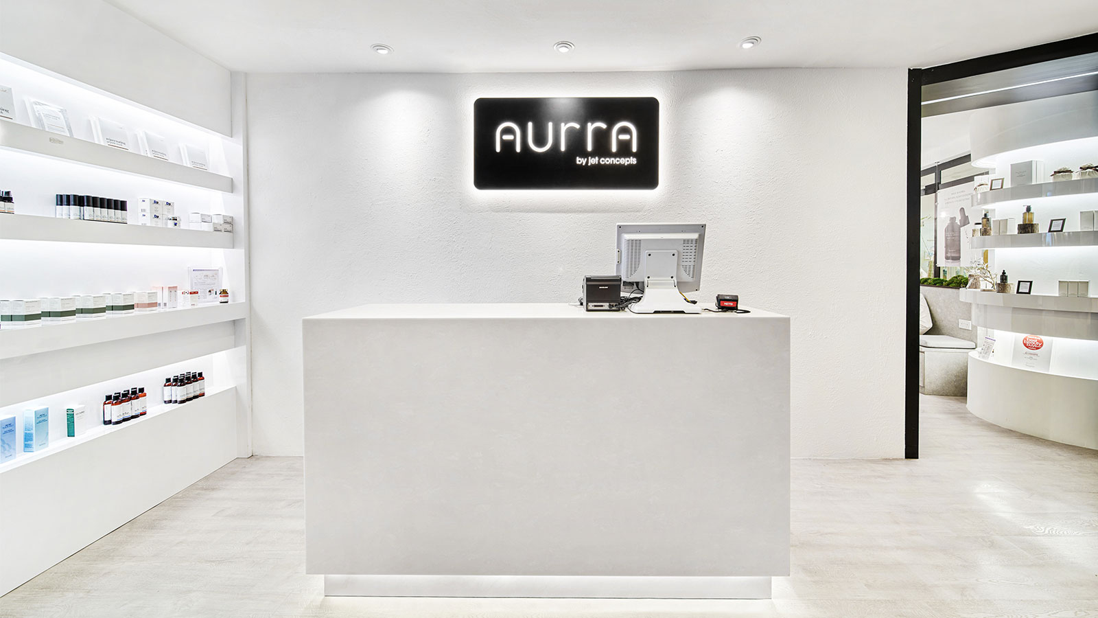 An image showing the main entrance of the AURRA Boutique at Wheelock Place.