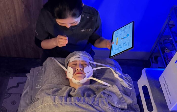 An image showing a patient having the WonderFace treatment at Aurra.